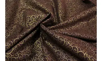 Tissu volutes dorées