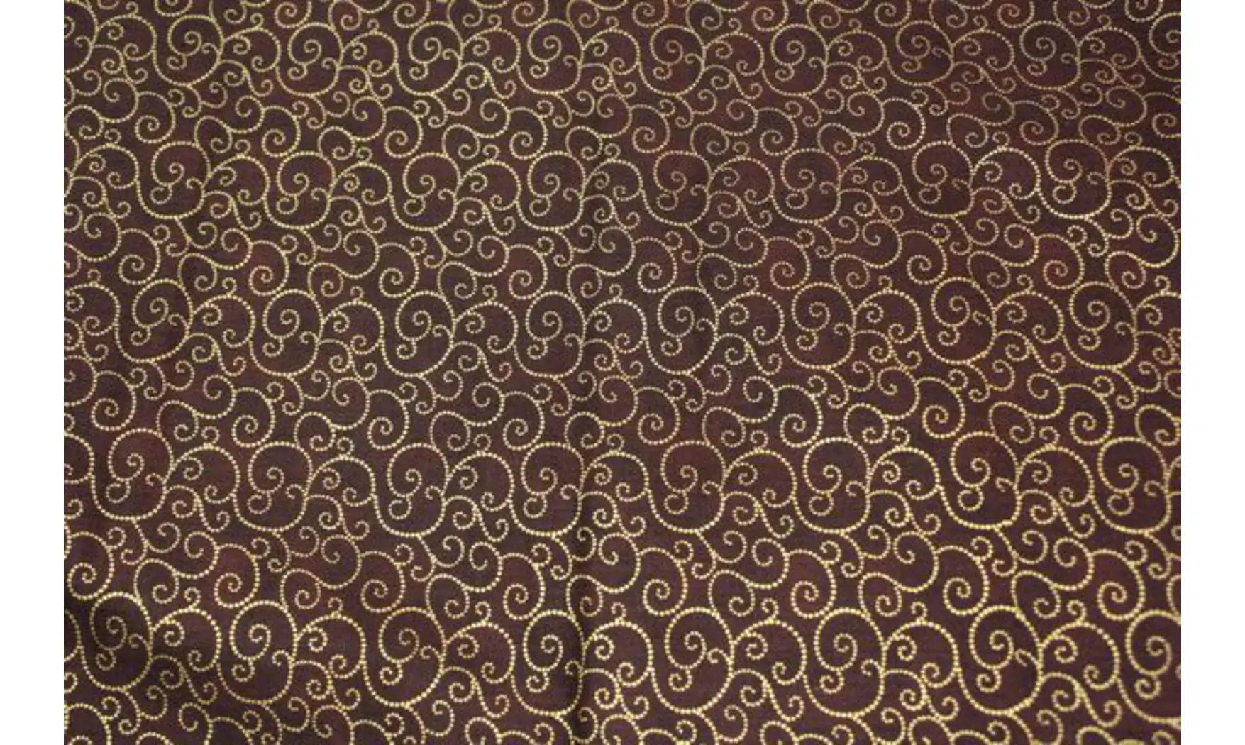 Tissu volutes dorées