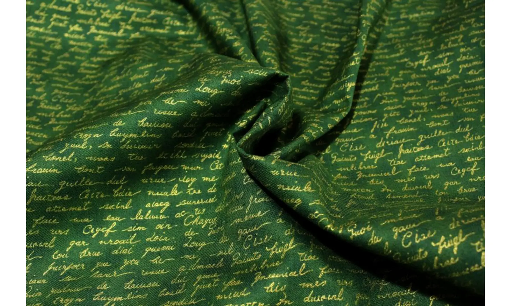 Tissu vert écritures dorées