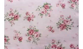 Tissu bouquets de roses fond rose pale