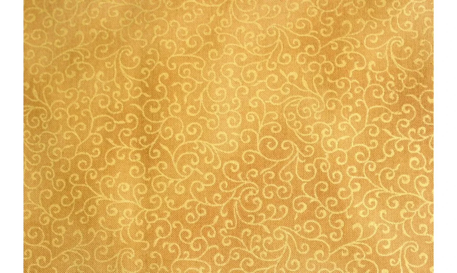 Tissu gold volutes dorées