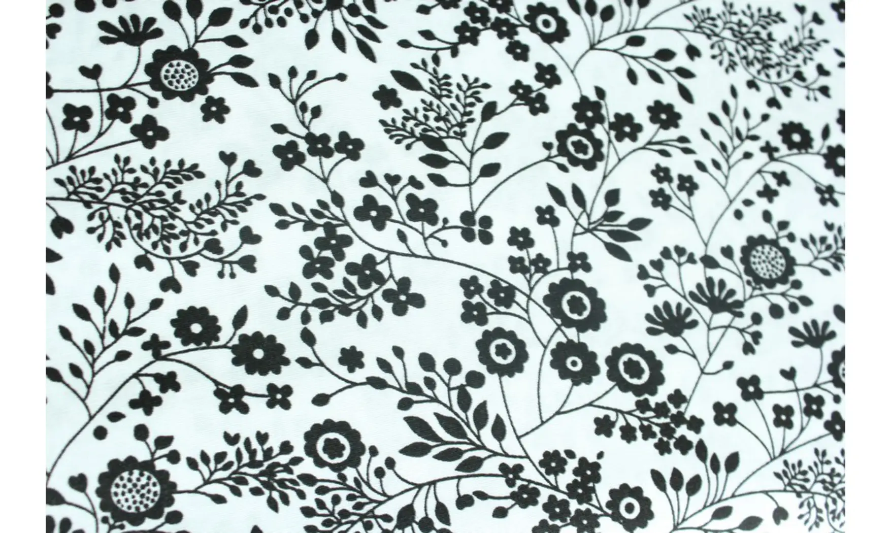 Tissu blanc floraison noire