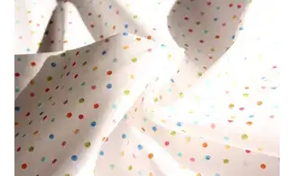 Tissu blanc points colorés