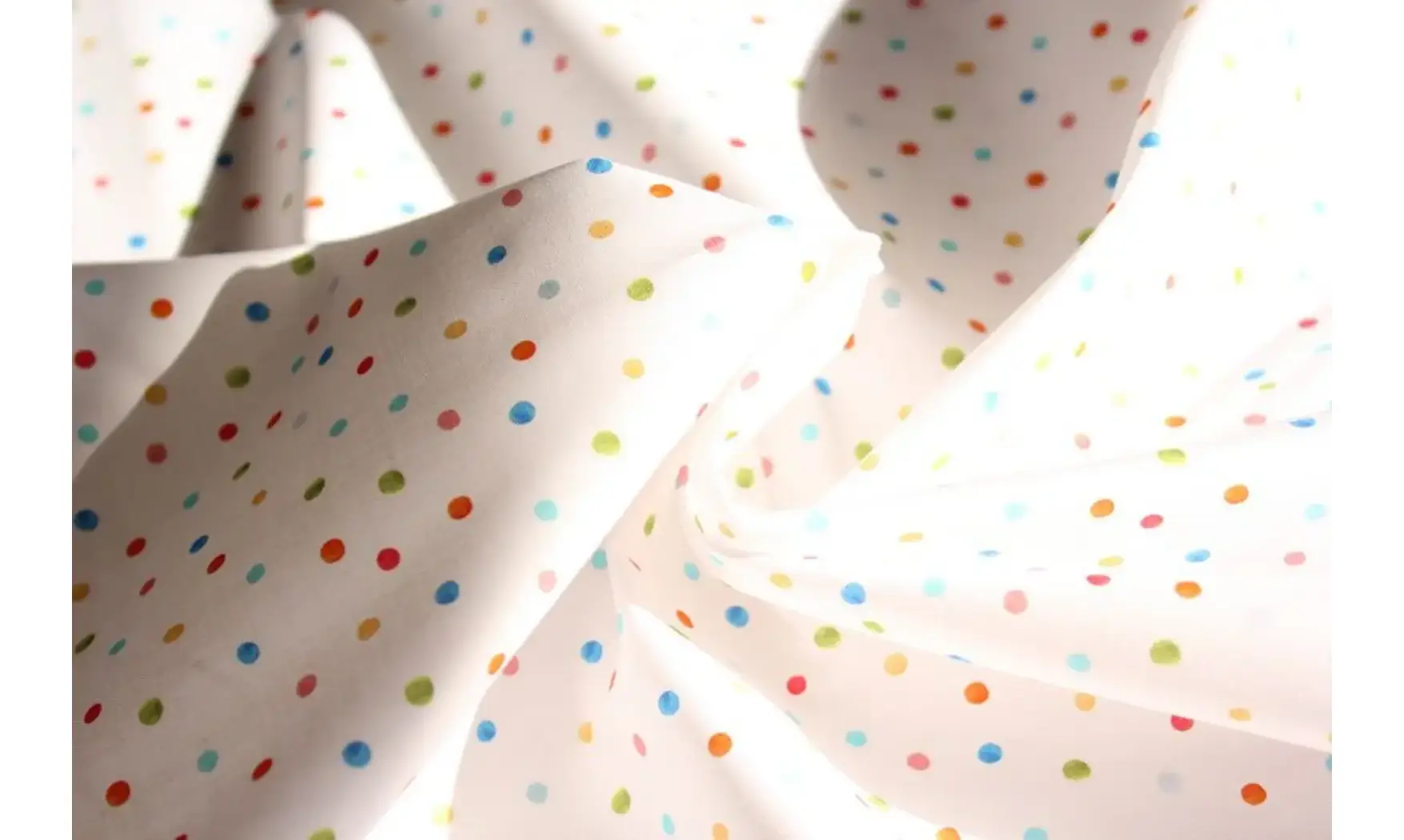 Tissu blanc points colorés