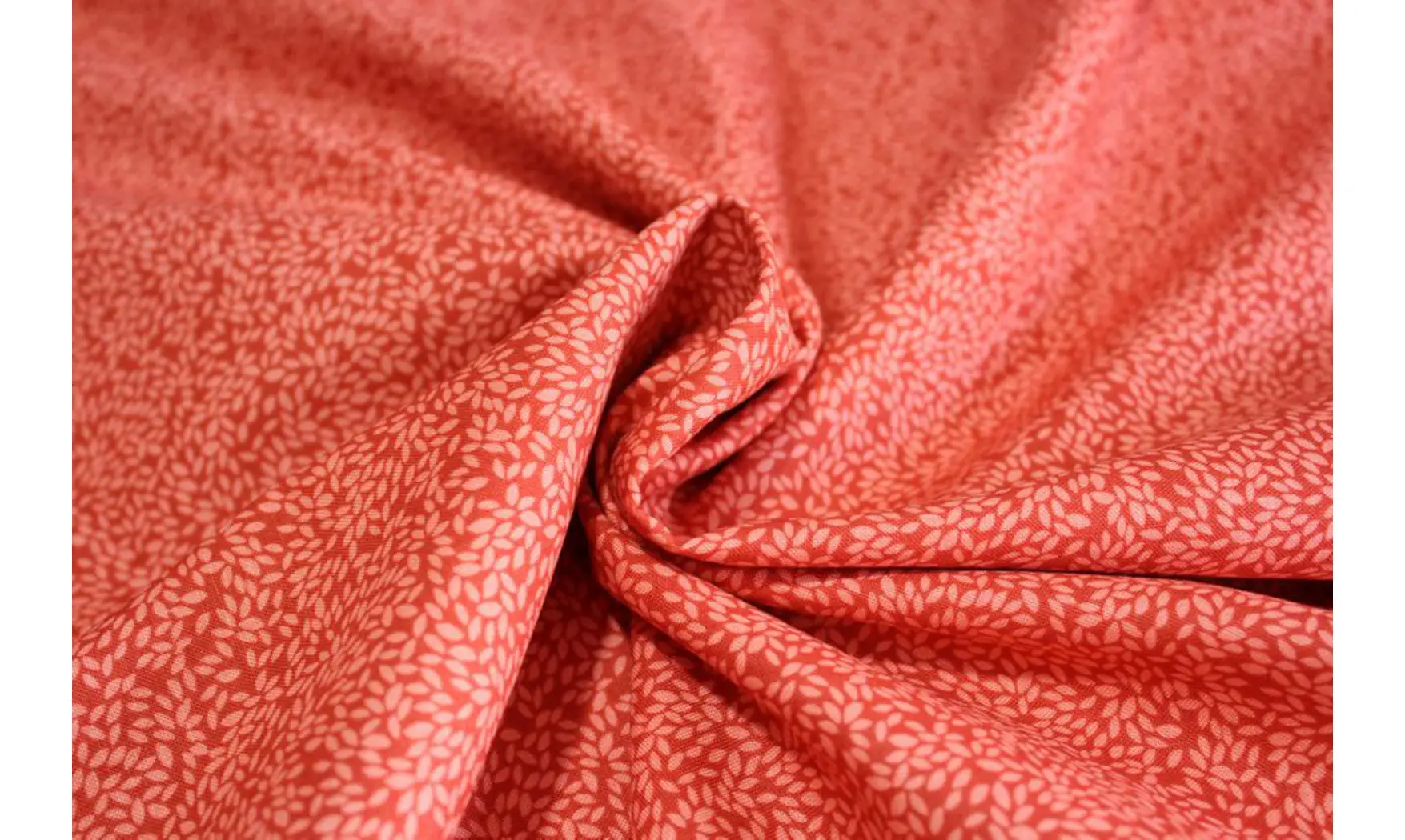 Tissu saumon ton sur ton