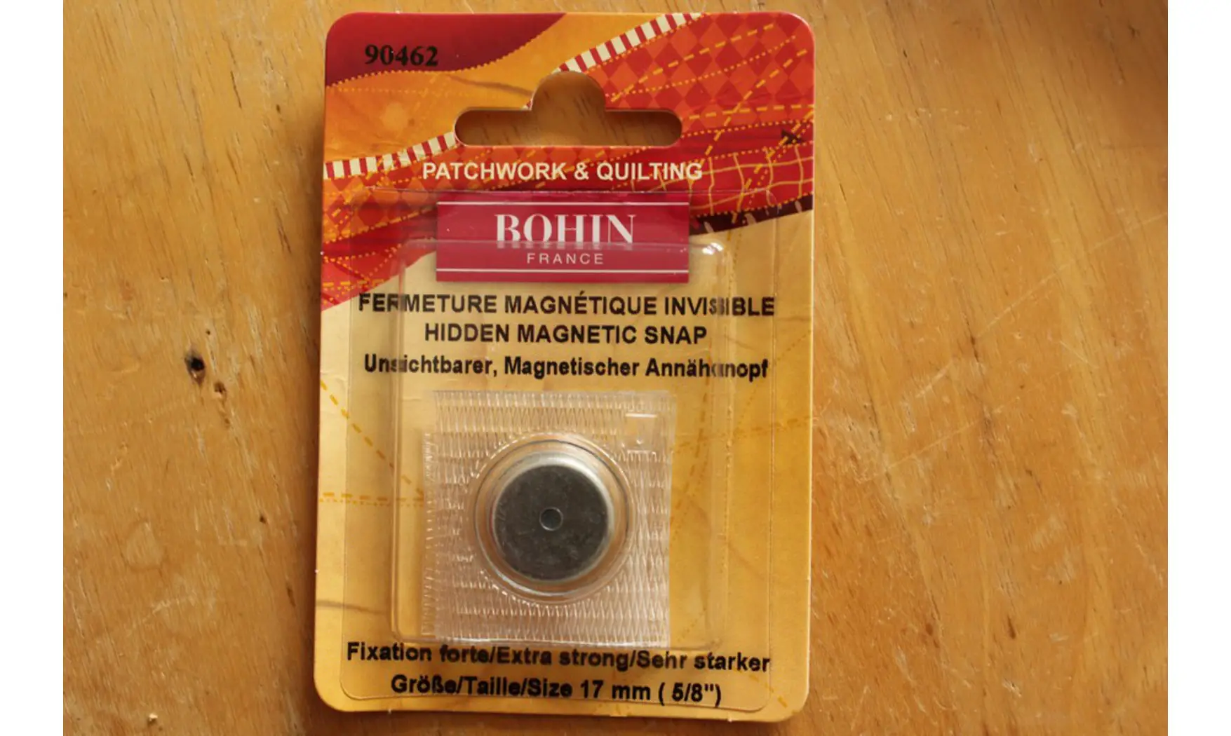 Bouton aimanté invisible