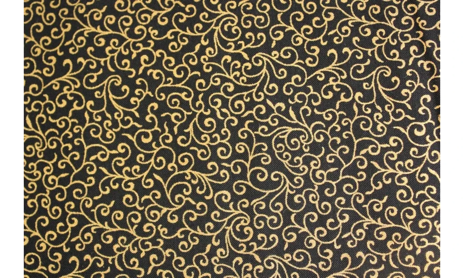 Tissu noir volutes dorées