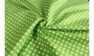 Tissu vert gros pois blancs