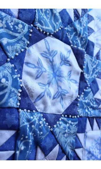 Etoile plumetée perlée