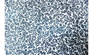 Tissu blanc feuillages noirs