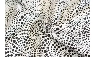 Tissu pois tourbillonnant