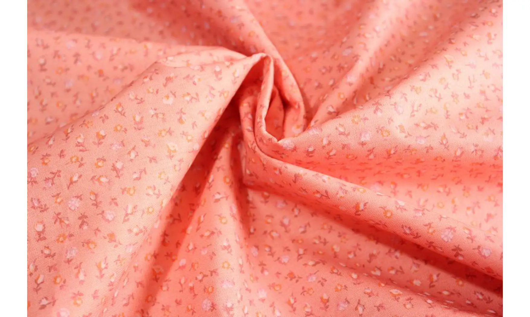 Tissu saumonade de fleurettes