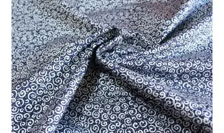 Tissu bleu volutes argent