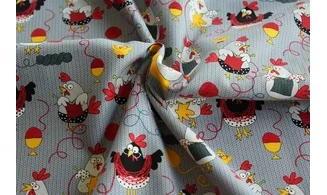 Tissu les poules tricotent