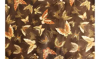 Tissu papillons dorés