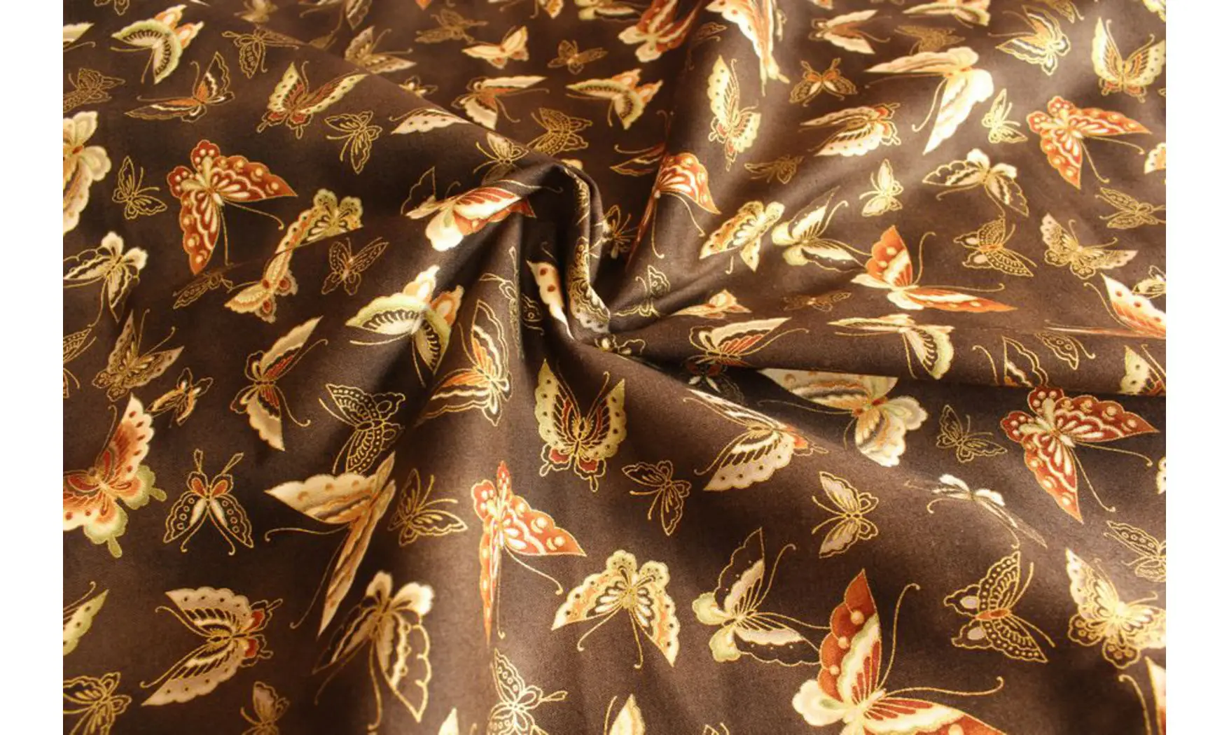 Tissu papillons dorés
