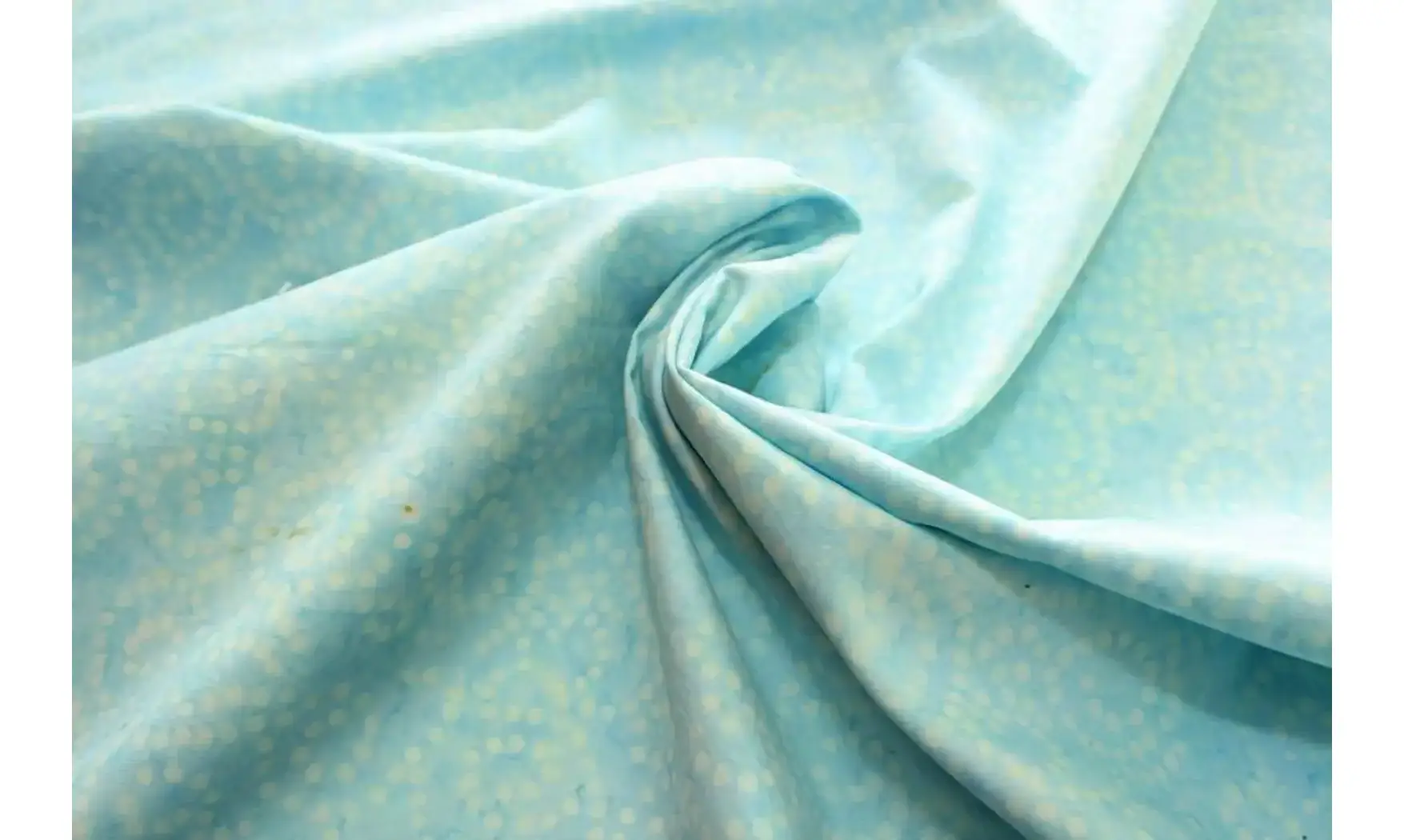 Batik volutes de points