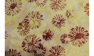 Batik jaune pale boules foncées